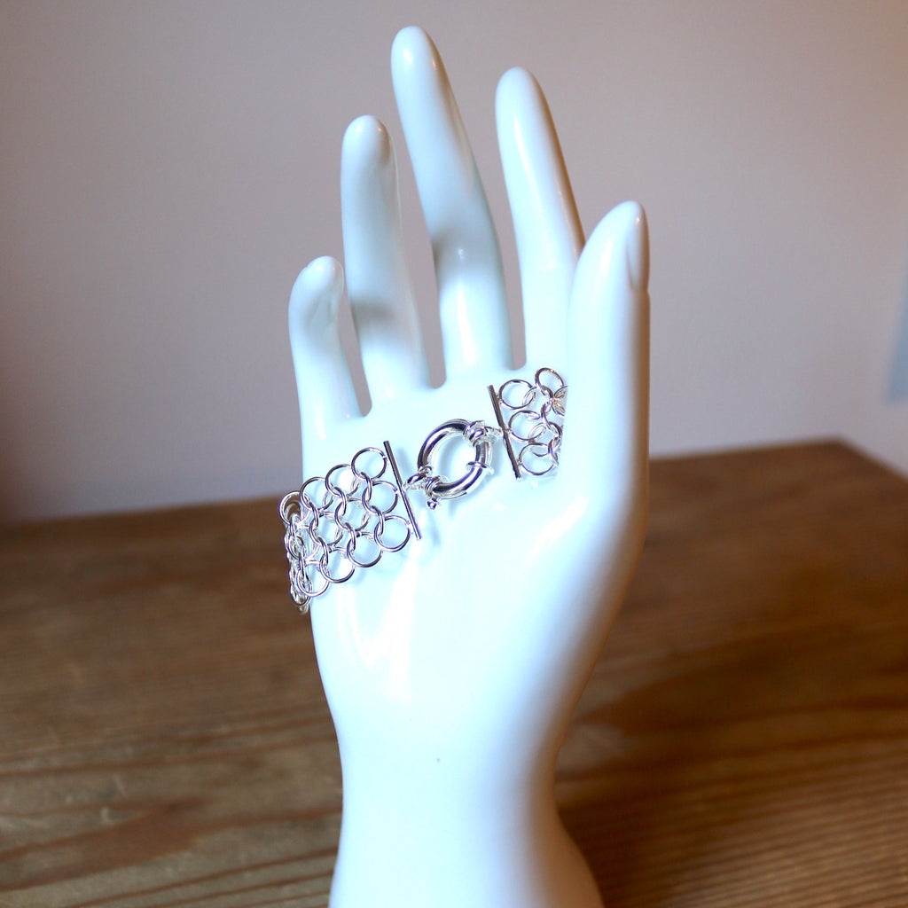 handmade chain mail bracelet silver on hand model